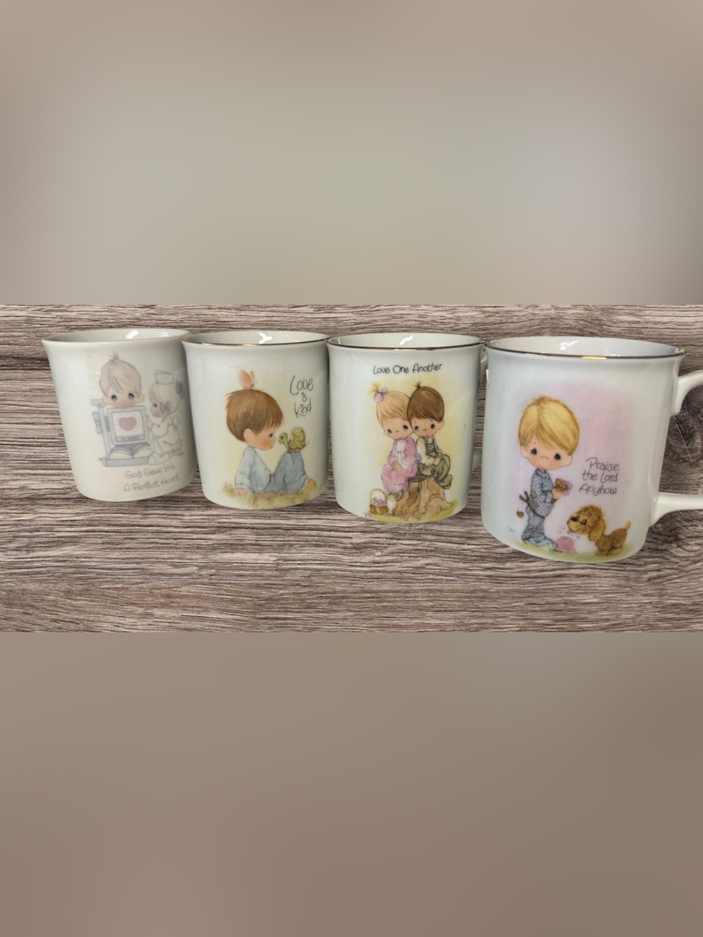 Like new! Set of 4 1984 & 1985 Precious Moments Licenesed by Enesco Cups/Mugs
